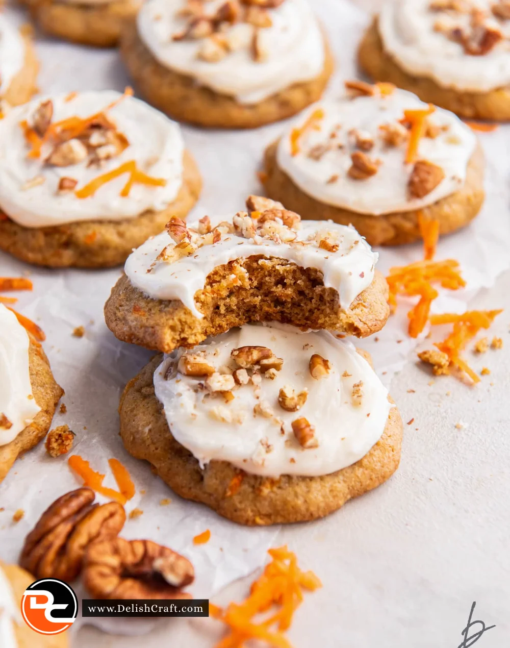 Delicious carrot cake cookies displayed on a wooden table.