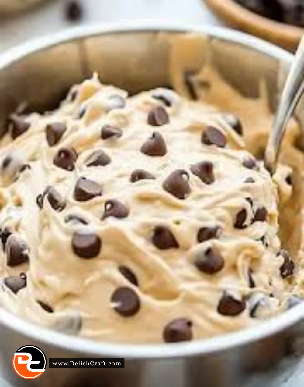 Delicious chocolate chip cookie dough dip served with a spoon.