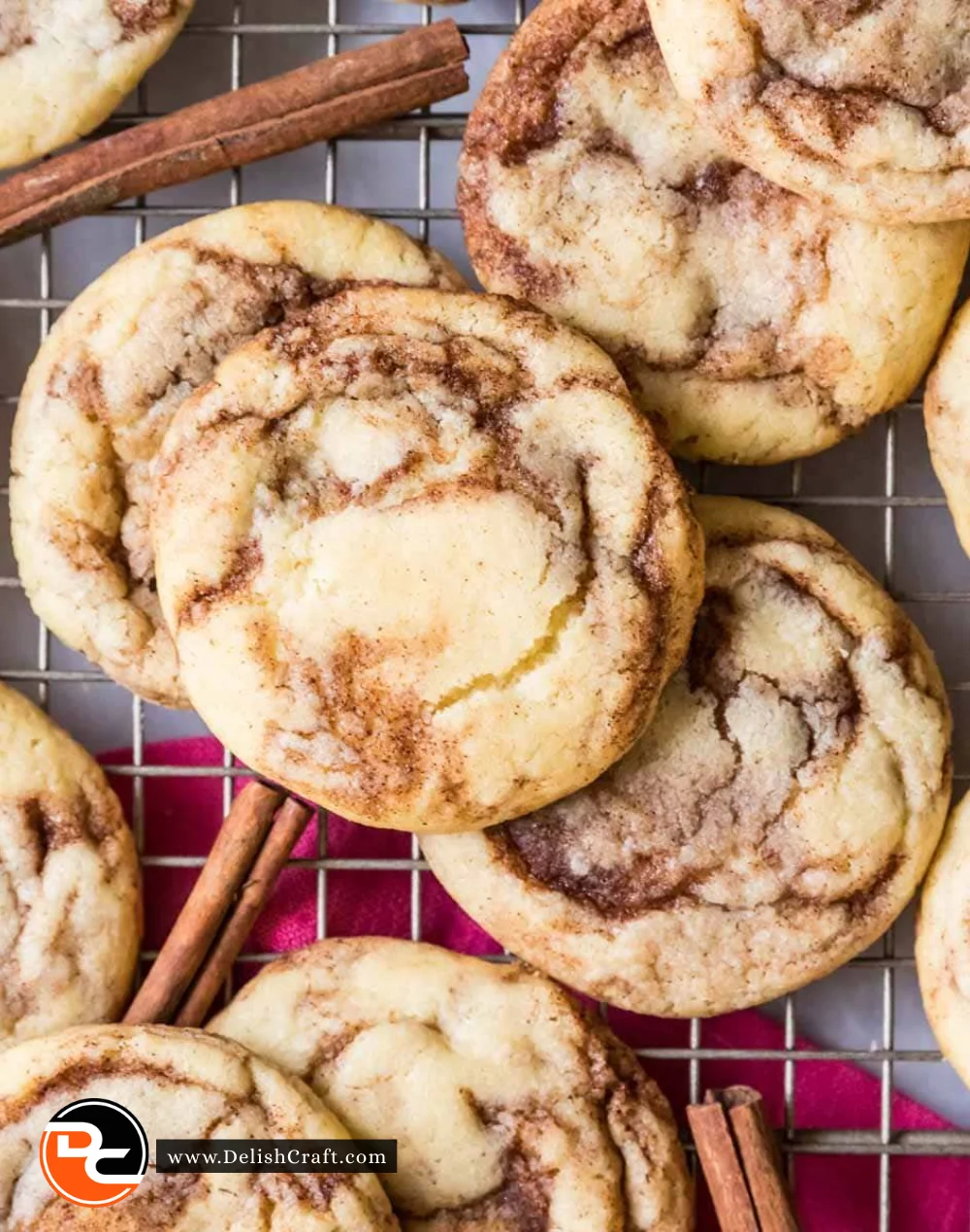 Freshly baked cinnamon cookies on a cooling rack