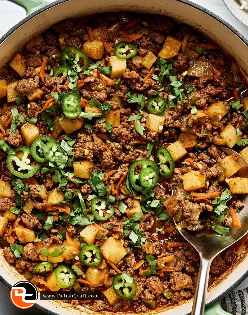 Deliciously prepared easy Picadillo served in a bowl with rice and vegetables