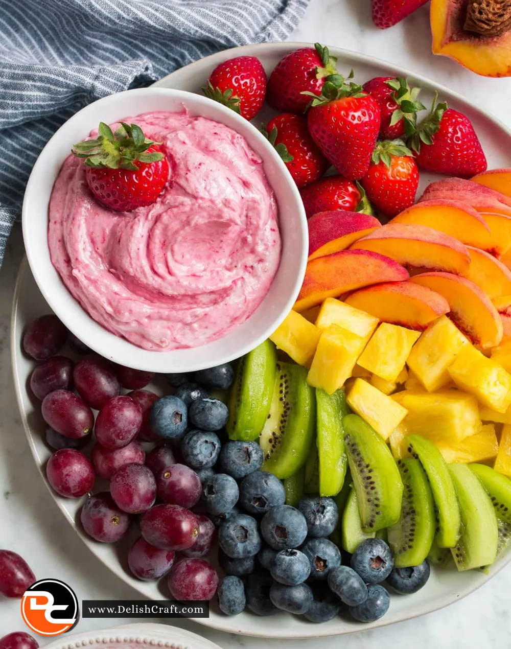 Delicious homemade fruit dip served with fresh fruits for dipping.