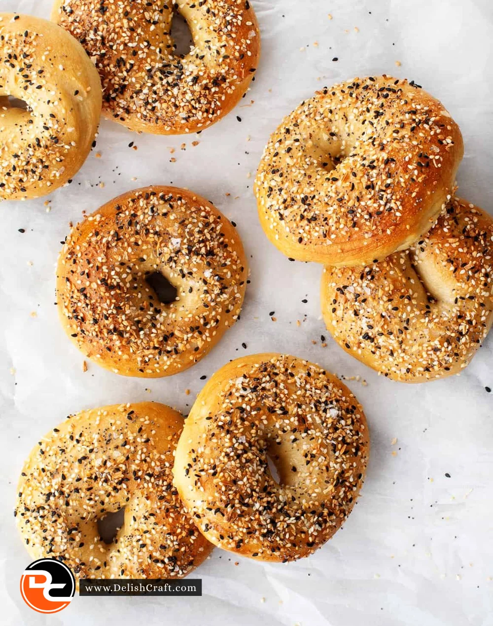 Freshly baked homemade bagels on a wooden board