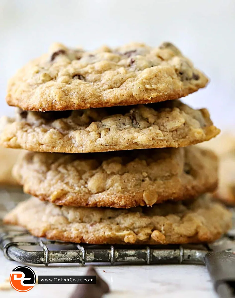 Freshly baked Nestlé chocolate chip cookies on a cooling rack