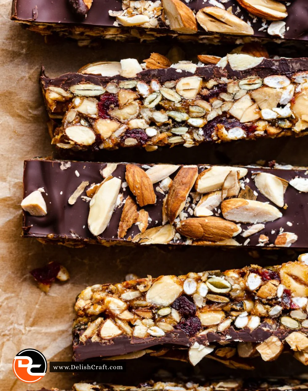 A delicious assortment of no bake granola bars with nuts and dried fruits.