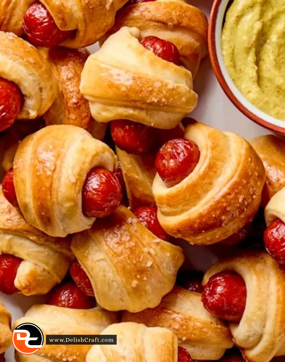 Delicious Pigs in a Blanket served with dipping sauce