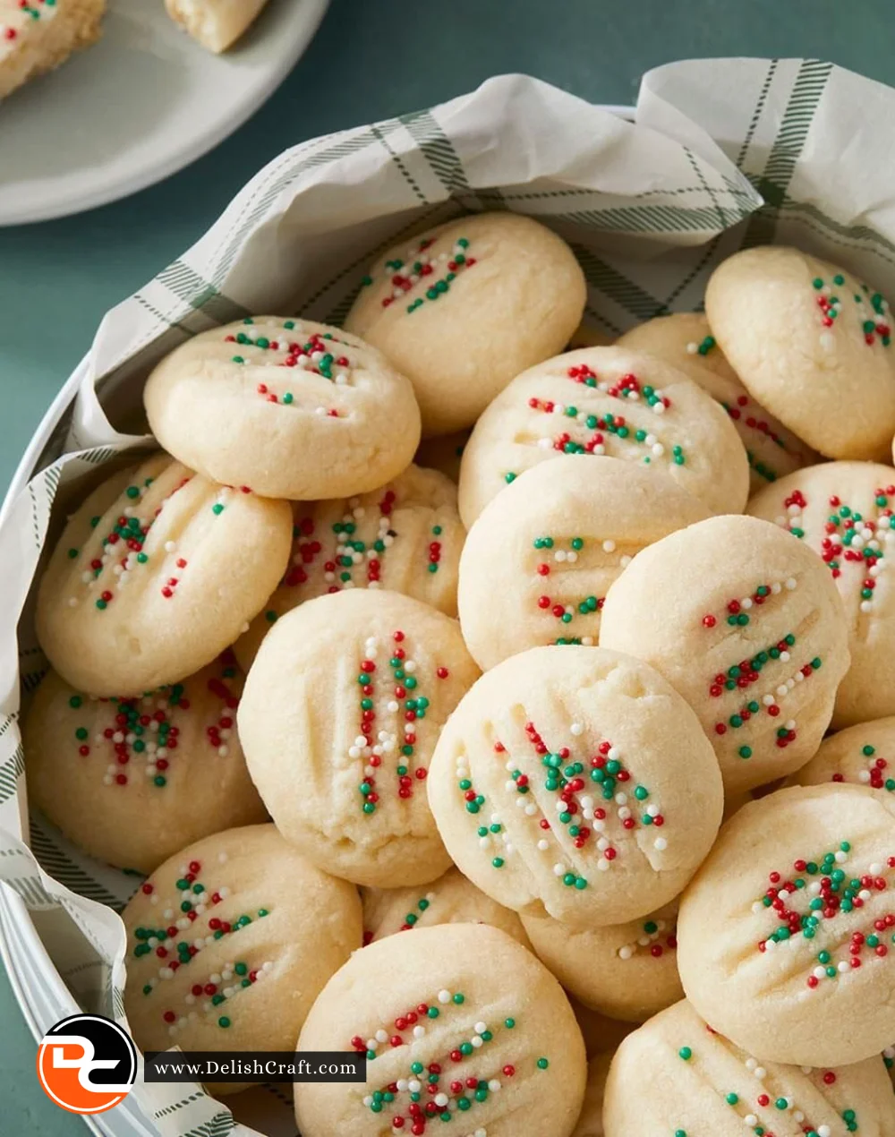 Homemade shortbread cookies arranged on a plate, perfect for any dessert occasion.