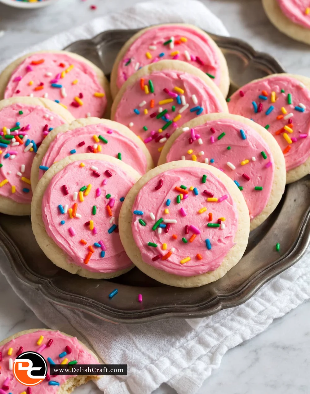 Delicious sugar cookie frosting on freshly baked cookies