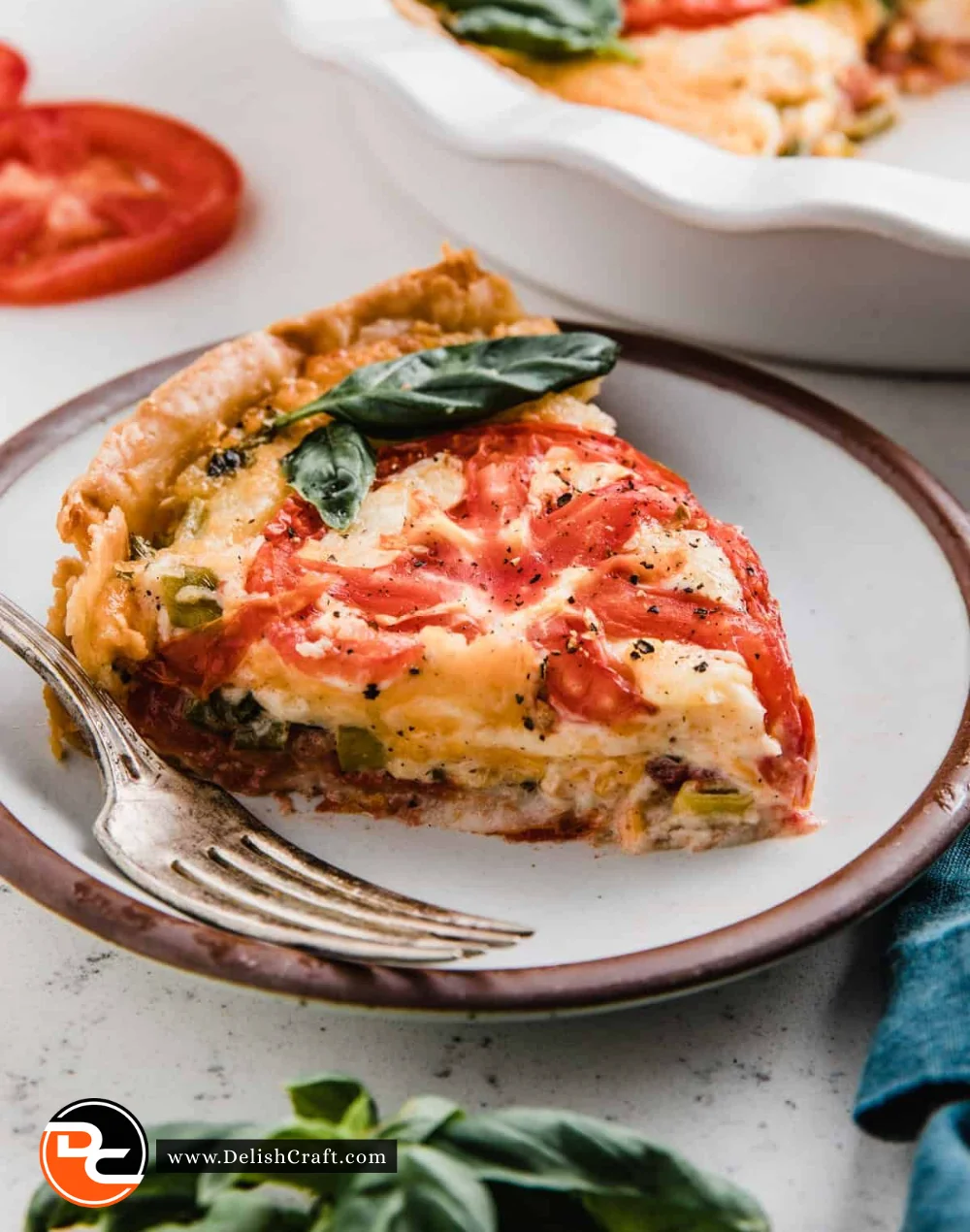Freshly baked tomato pie with vibrant tomatoes on a golden crust