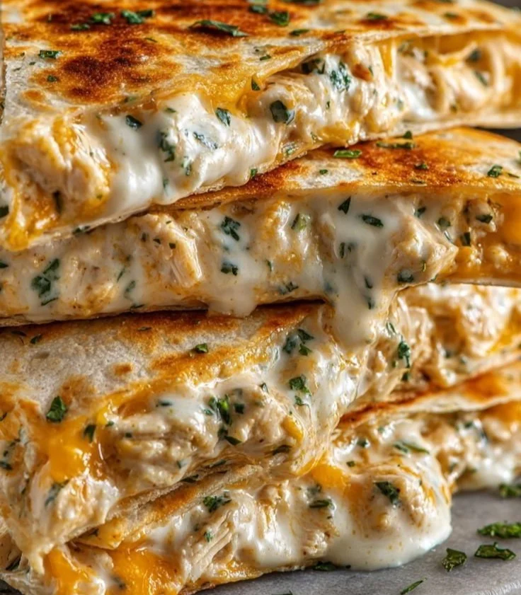 Delicious Chicken Ranch Quesadilla with melted cheese and fresh toppings