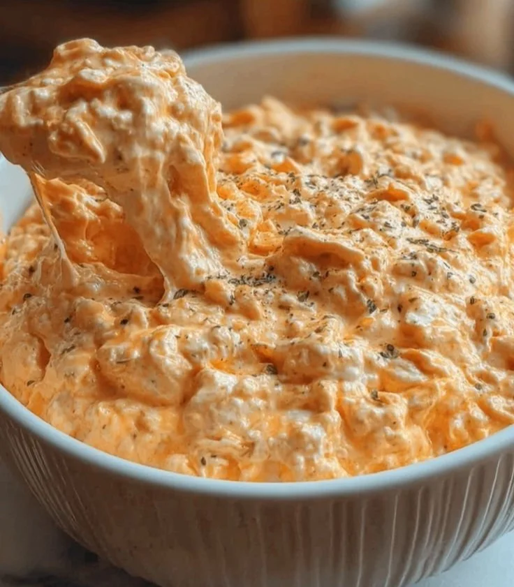 Cottage Cheese Buffalo Chicken Dip served in a bowl with tortilla chips