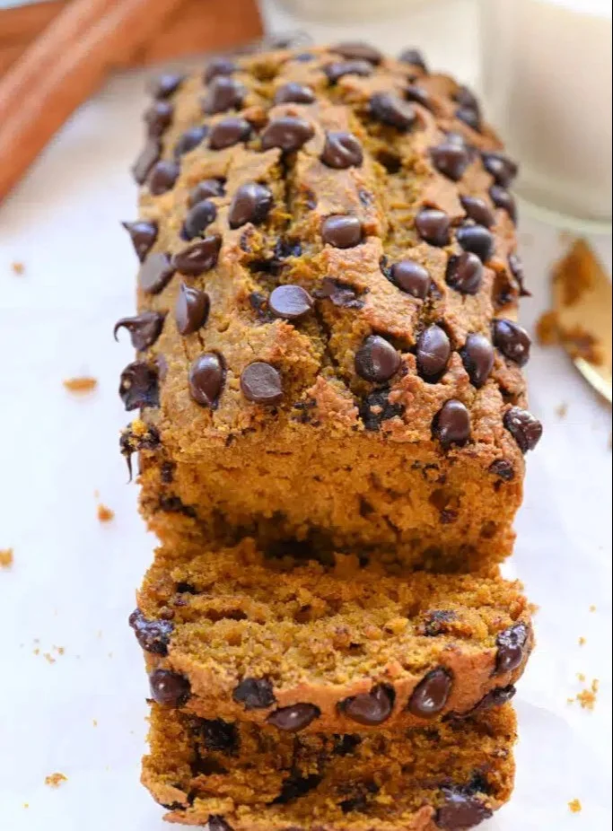 Protein pumpkin bread with chocolate chips on a wooden table