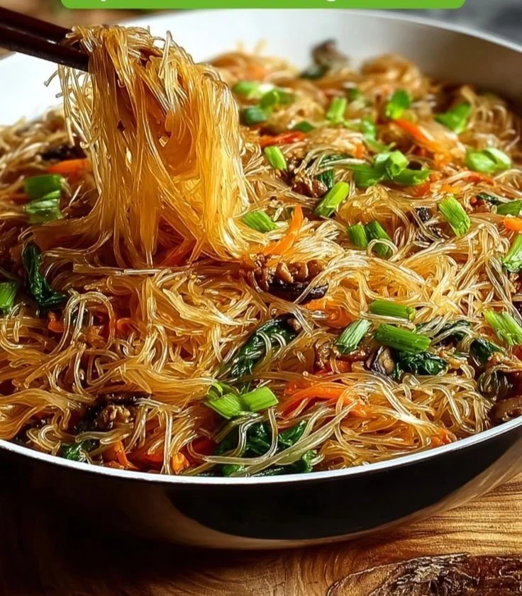 Delicious rice noodle stir-fry with fresh vegetables and sauce