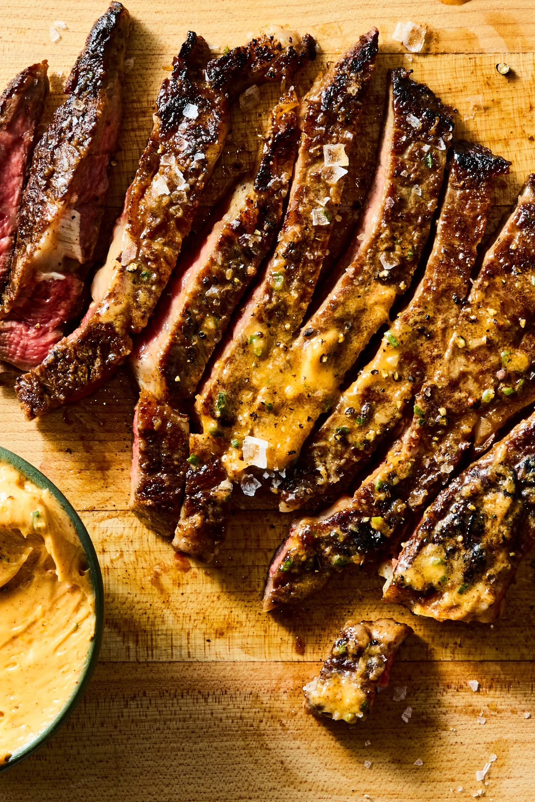 Delicious Cowboy Butter Steak garnished with herbs and spices