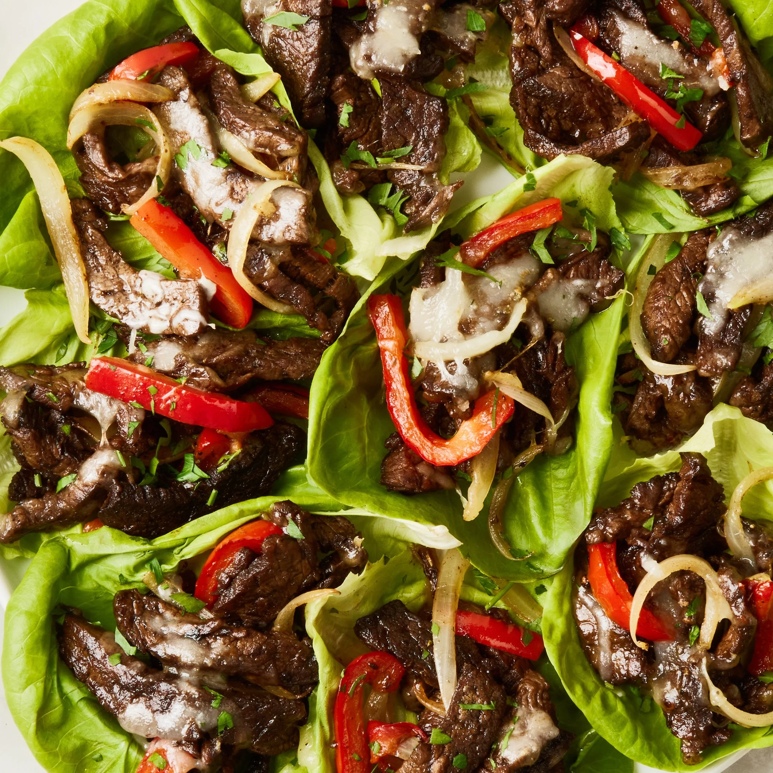 Philly-style cheesesteak lettuce wraps on a plate