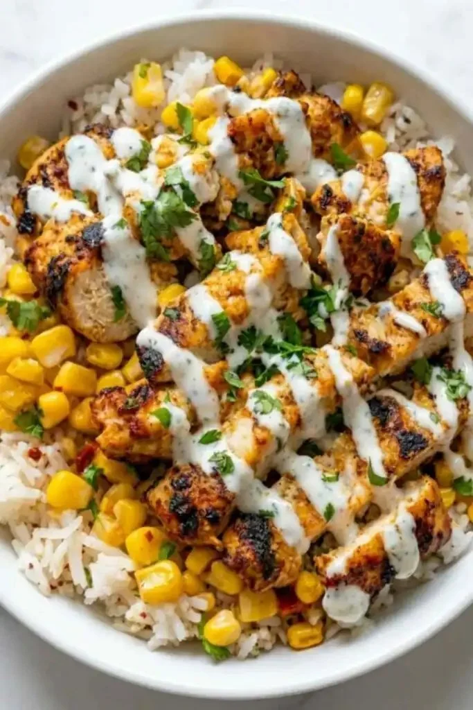 Delicious protein-packed street corn chicken bowls with vibrant toppings